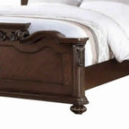 Lit Queen en bois sculpté et rembourré en noyer foncé