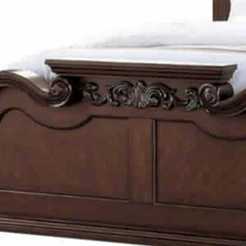 Lit Queen en bois sculpté et rembourré en noyer foncé