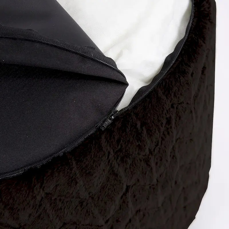 Pouf en fourrure Angora ébène