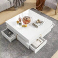 Table basse design laquée avec 4 tiroirs